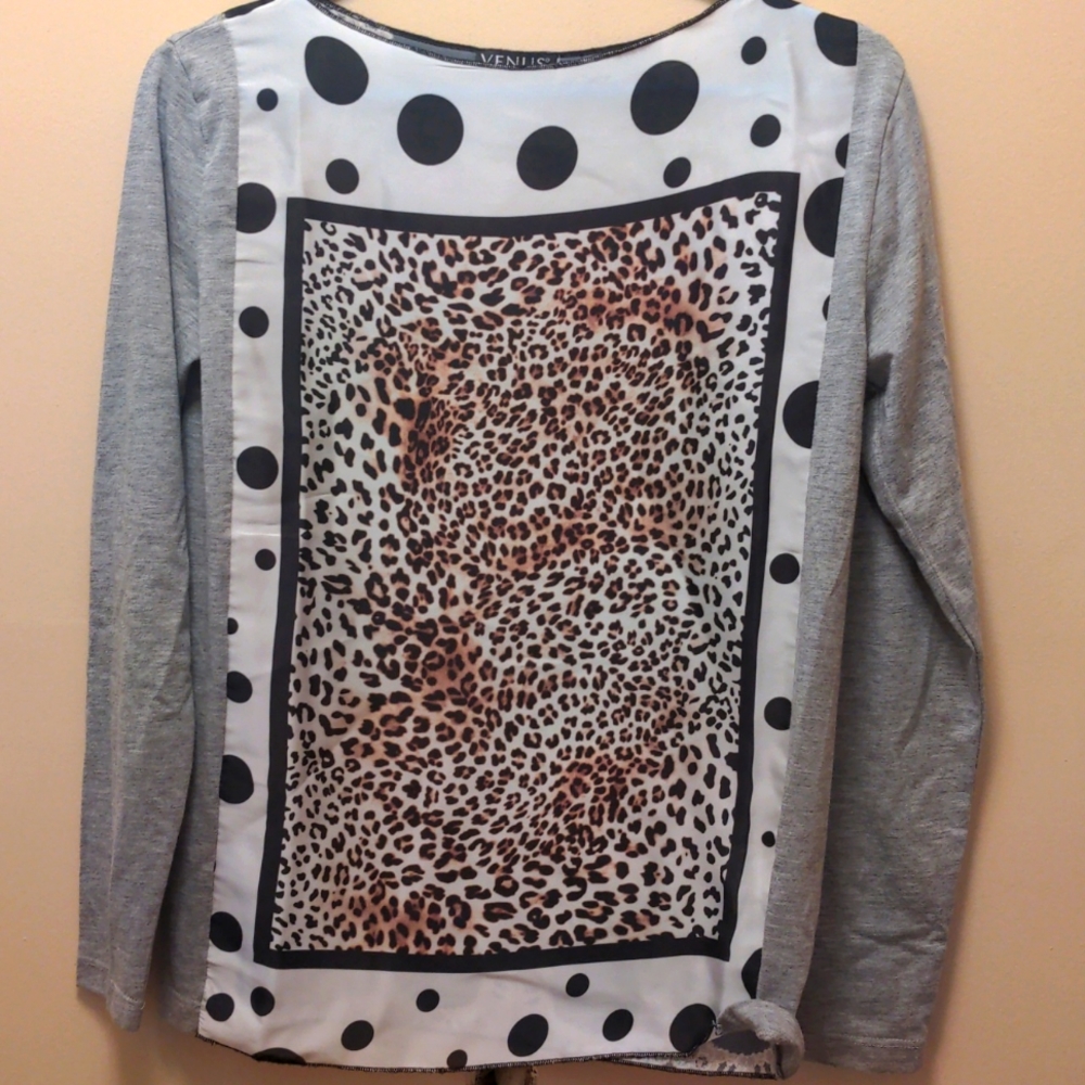 Women's print cotton/poly blouse. 23" length